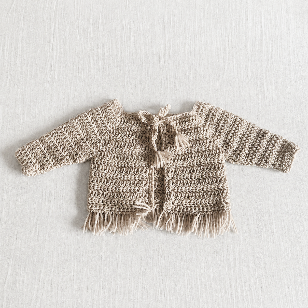 Cardigan in Lana all’Uncinetto con Frange